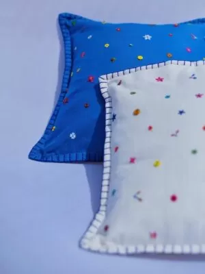 ditsy hand embroidered cushion 1